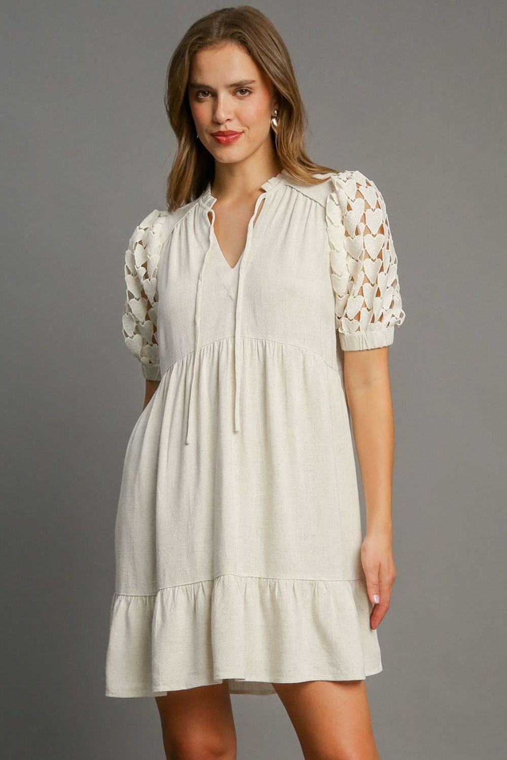 Oatmeal Heart Lace Ruffle Dress - Oatmeal Tie Neck Apparel & Accessories > Clothing > Dresses autopostr_pinterest_71901 autopostr_pinterest_72819 Only Available for U.S. Residents Ship from USA sync-pinterest Umgee USA