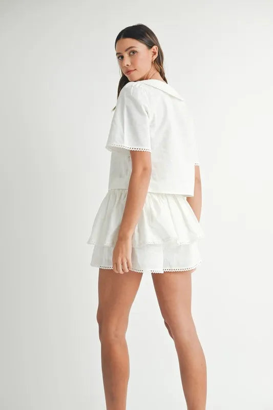 Chic Collared Button-Down Crop Top and Skort Set with Lace Detail Apparel & Accessories > Clothing > Outfits & Sets autopostr_pinterest_72819 MABLE Only Available for U.S. Residents Ship from USA sync-pinterest