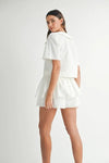 Crop Top Skort Set - Buttoned Lace Detail - Two-Piece Outfit Apparel & Accessories > Clothing > Outfits & Sets autopostr_pinterest_71901 autopostr_pinterest_72819 MABLE Only Available for U.S. Residents Ship from USA sync-pinterest